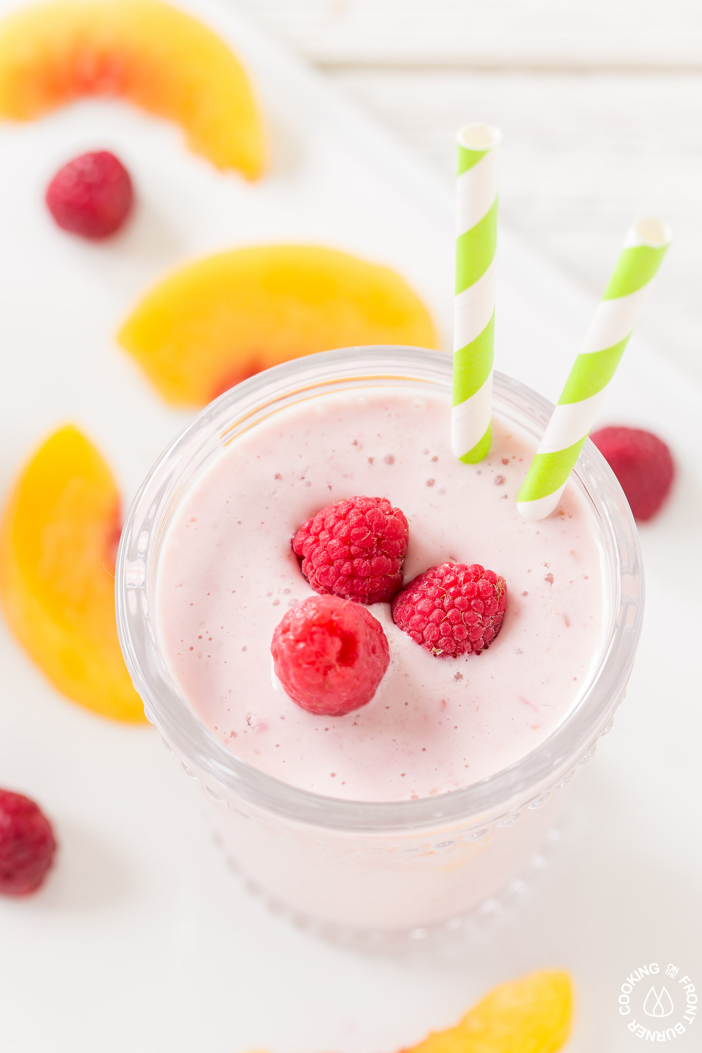 https://www.cookingonthefrontburners.com/wp-content/uploads/2018/01/Easy-Peach-Raspberry-Smoothie.jpg