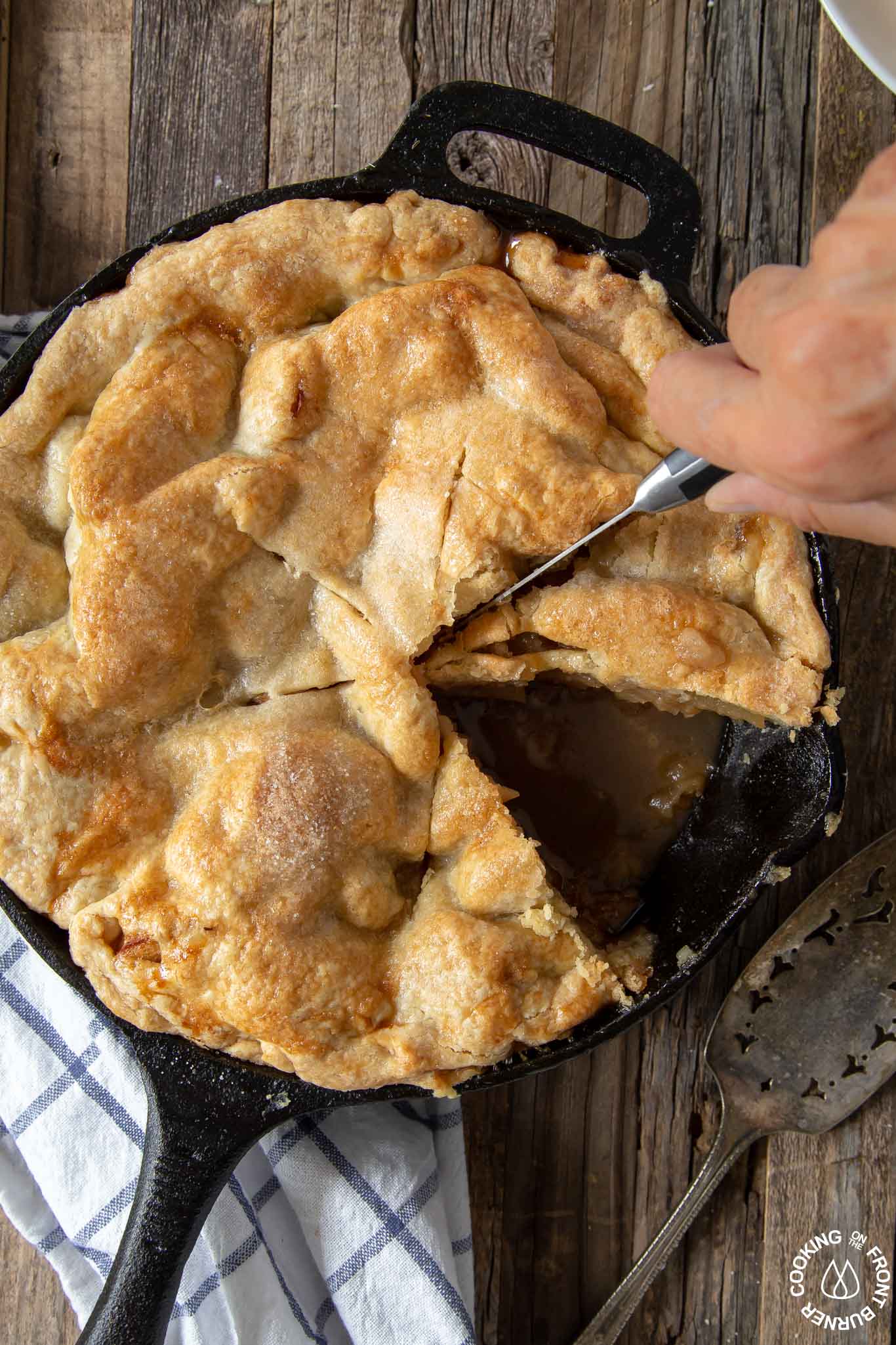 Cast Iron Skillet Apple Pie Cooking On The Front Burner